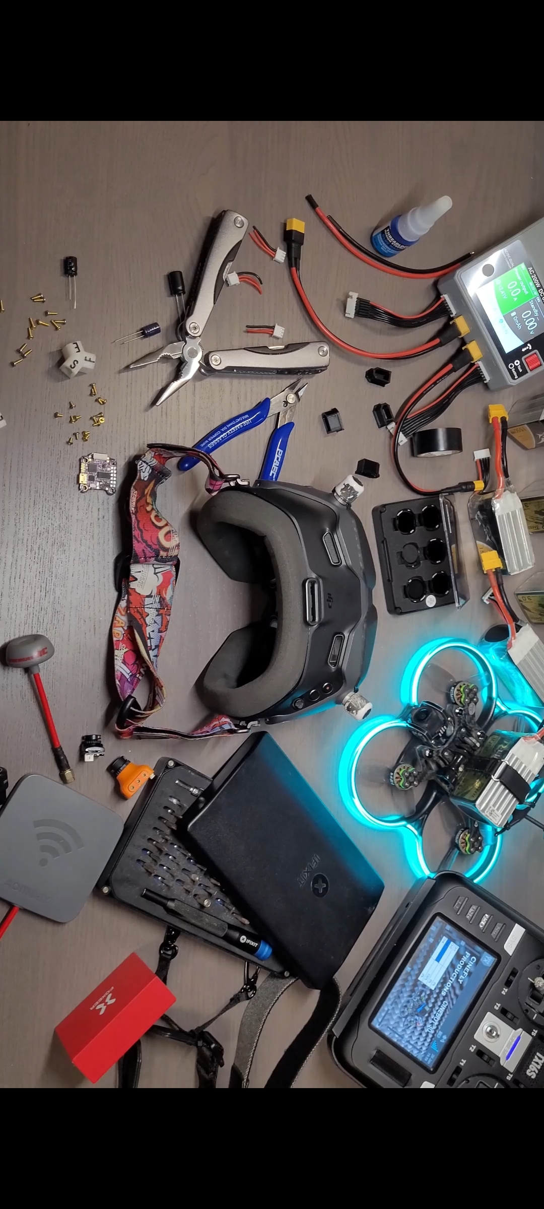 A desk with fpv goggles on top